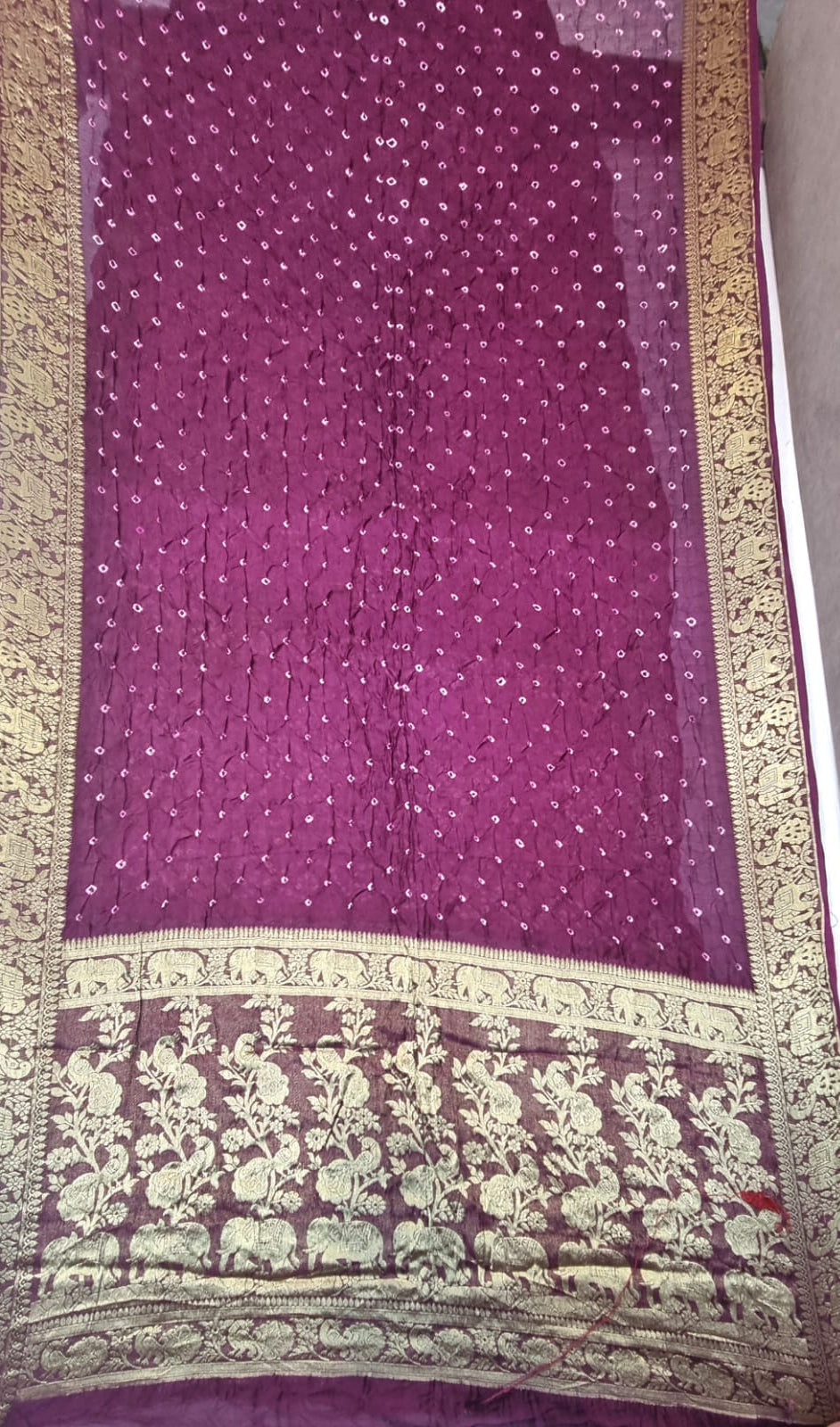 Art Silk Bandhani with Golden Zari - Wine, laid flat against a neutral background.