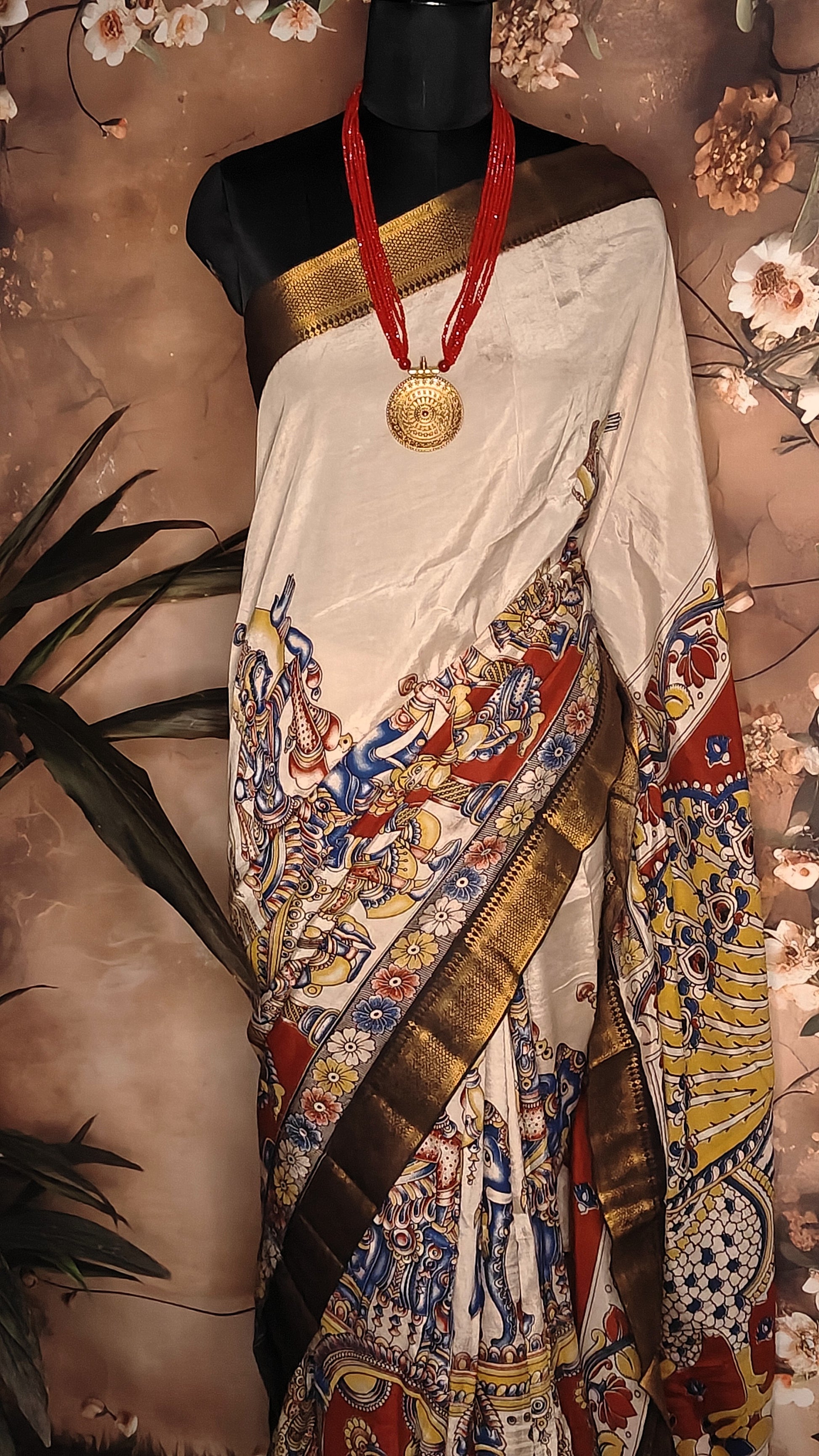 Handcrafted Mangalgiri Border Silk Saree with Temple Art Motifs-Cream color saree with intricate patterns on a mannequin against a neutral background.