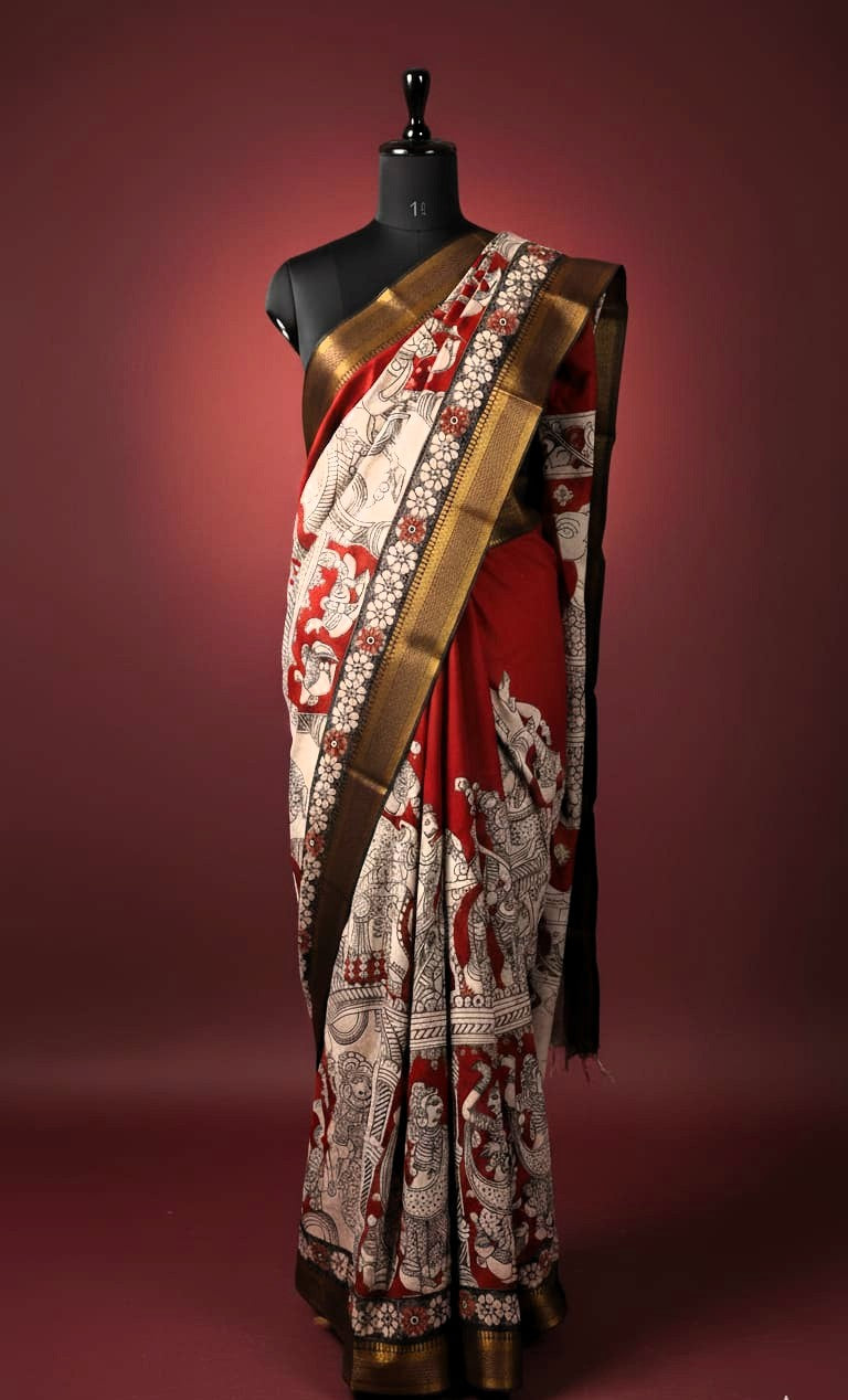 Handcrafted Mangalgiri Border Silk Saree with Temple Art Motifs-Red color saree with intricate patterns on a mannequin against a neutral background.