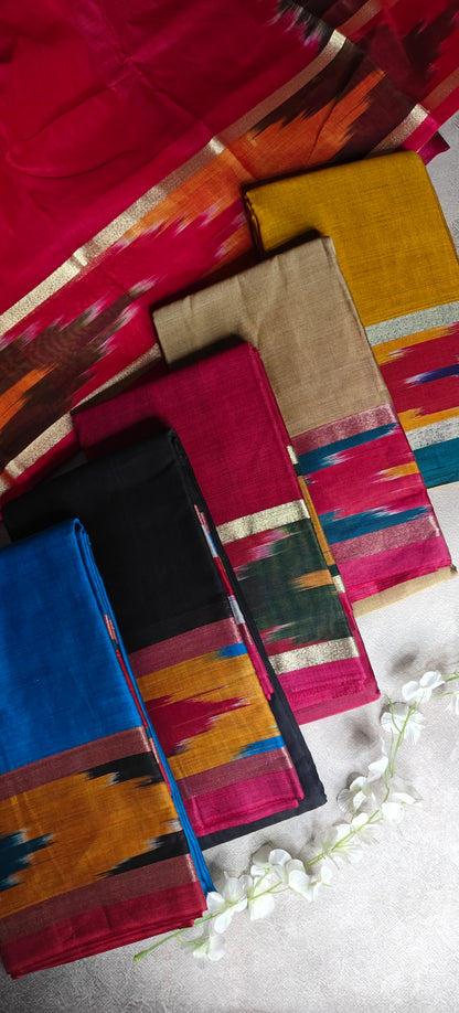 Stack of colorful handloom cotton sarees in Magenta, dark magenta, blue, golden, black, and mustard yellow color swatches on a textured surface with floral elements.