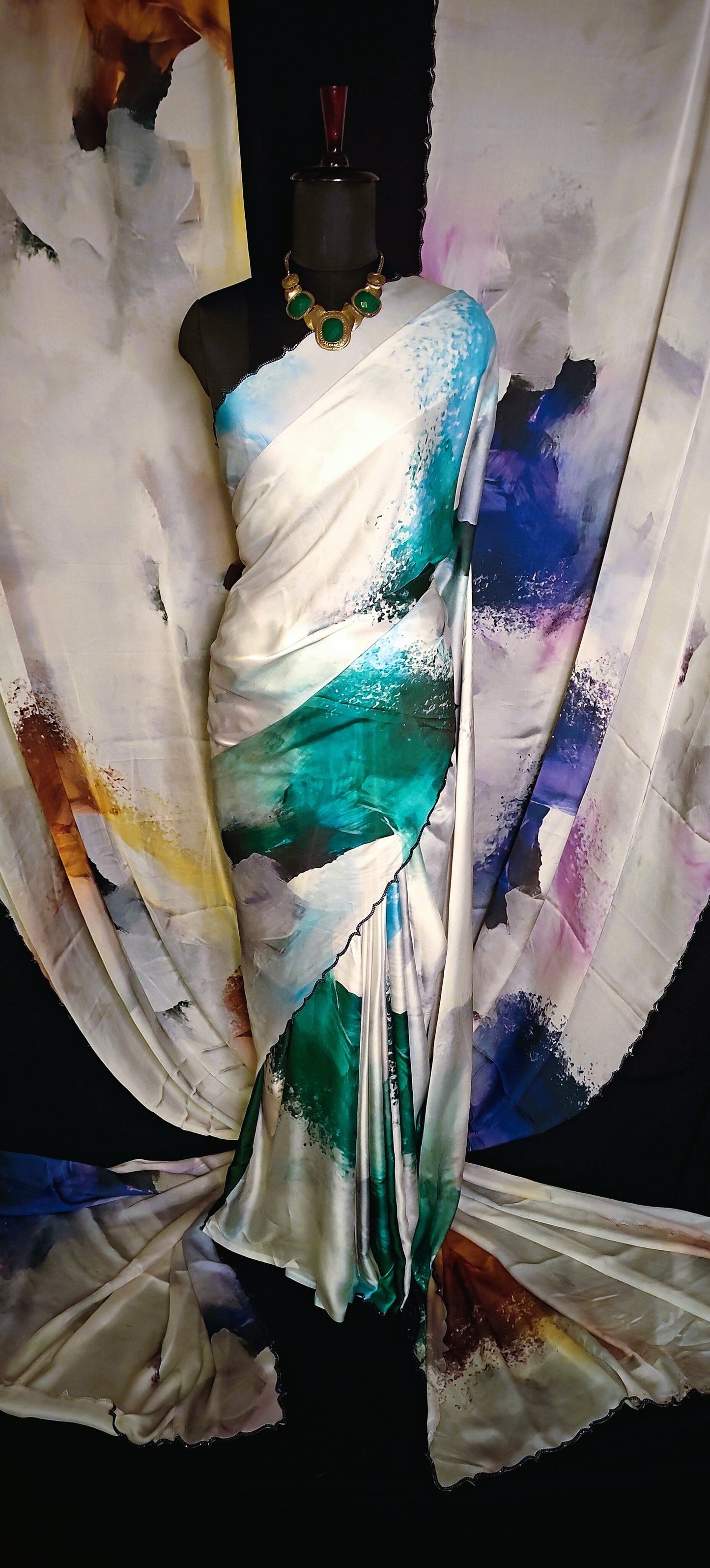 Satin-Georgette Saree with Abstract Brushstroke Design – Available in base white color with strokes of brown, blue, and green.