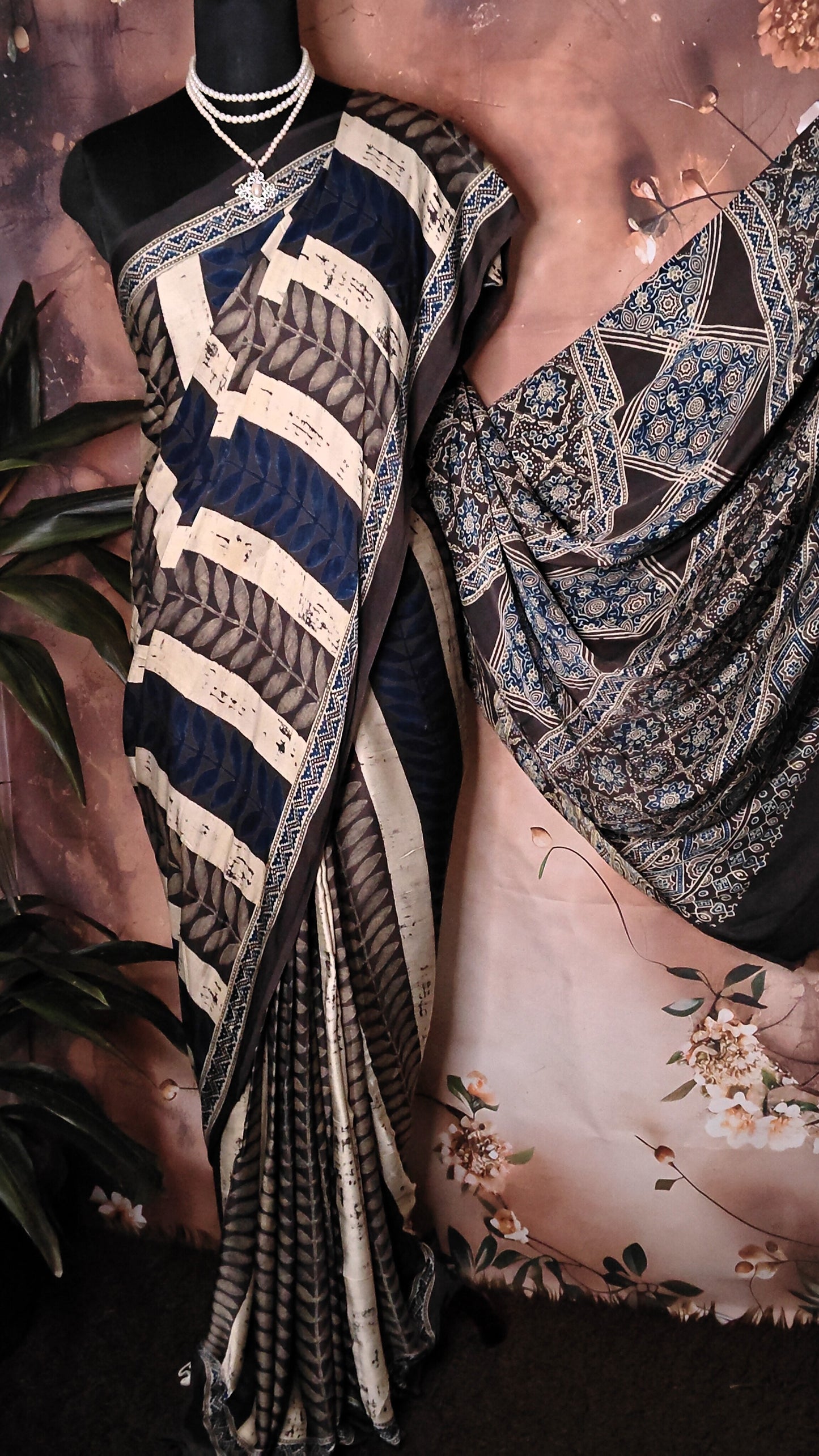Ajrakh Modal Silk Saree – Dark Blue, Beige & Black with Geometric Floral Pallu saree with intricate patterns draped over a mannequin.