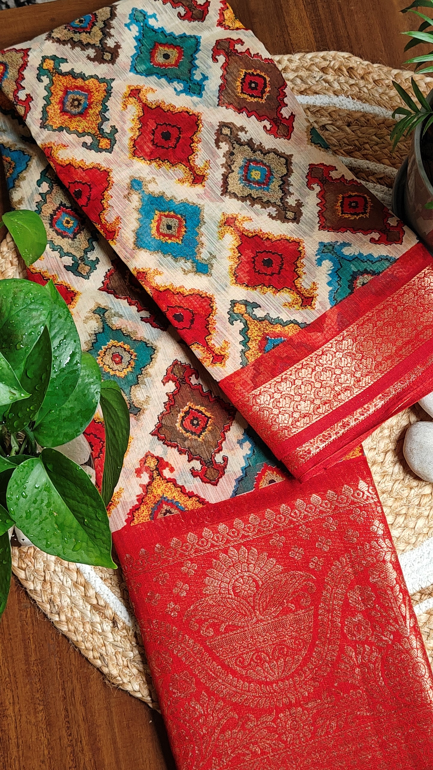 Designer Cotton Blend Saree – Patola Print with Zari Border saree draped on a mannequin.