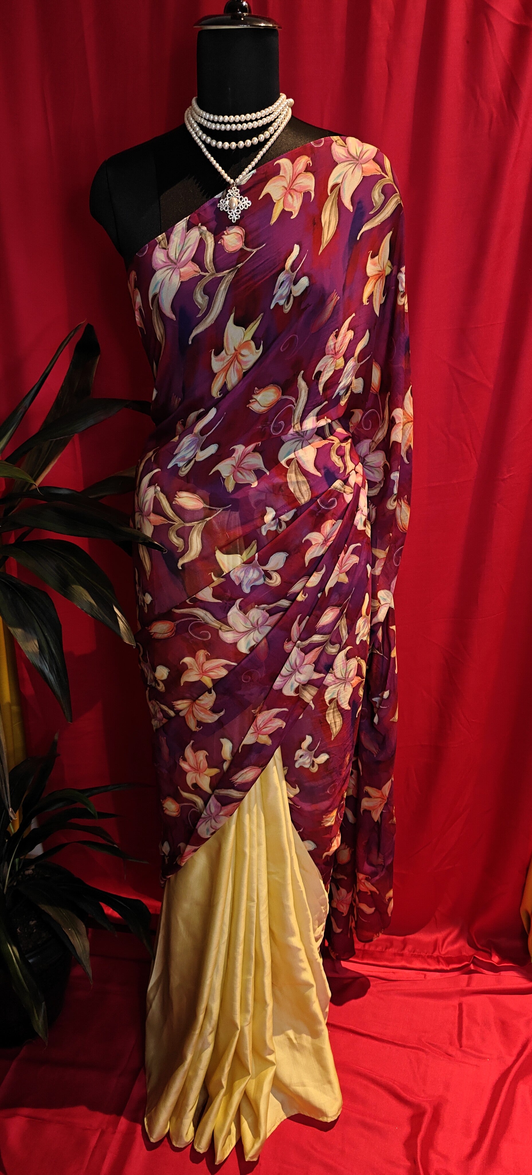Designer Strawberry Silk Saree – Yellow & Purple with Floral Pure Organza Pallu draped on a mannequin.
