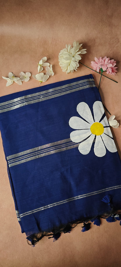 Navy cotton saree with hand-painted sunflower motifs and tassel border, breathable traditional Indian attire.