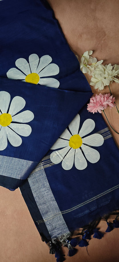 Navy cotton saree with hand-painted sunflower motifs and tassel border, breathable traditional Indian attire.