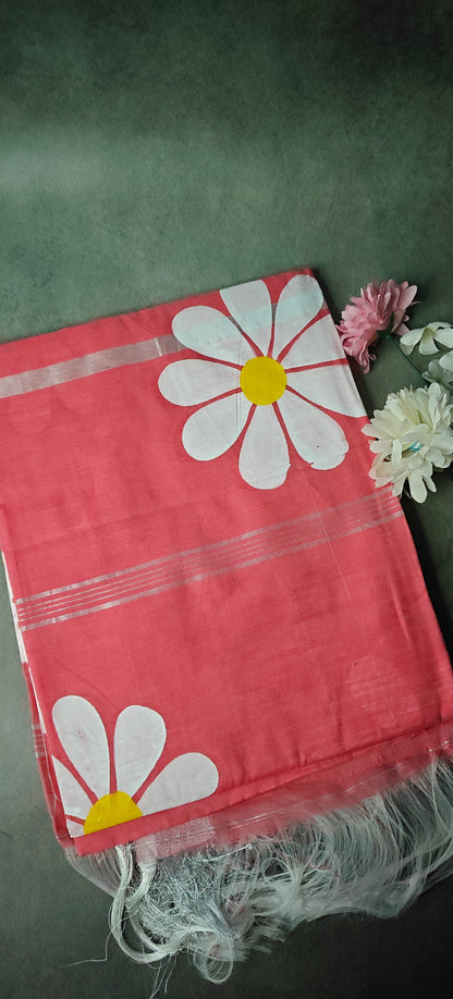 Pink cotton saree with hand-painted sunflower artwork and silver border, lightweight ethnic fashion.