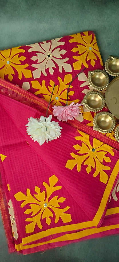 Dark Pink Kota saree with symmetrical white floral appliqué and soft texture, handcrafted traditional Indian saree.