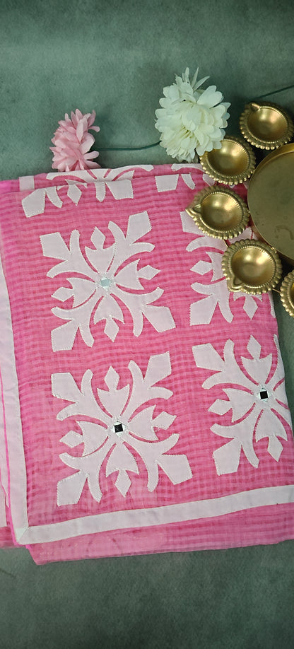 Pink Kota saree with symmetrical white floral appliqué and soft texture, handcrafted traditional Indian saree.