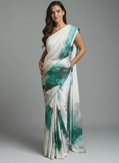 Lady wearing green satin-georgette saree with expressive brushstroke motifs and scalloped border, modern ethnic saree for cultural occasions against grey background.