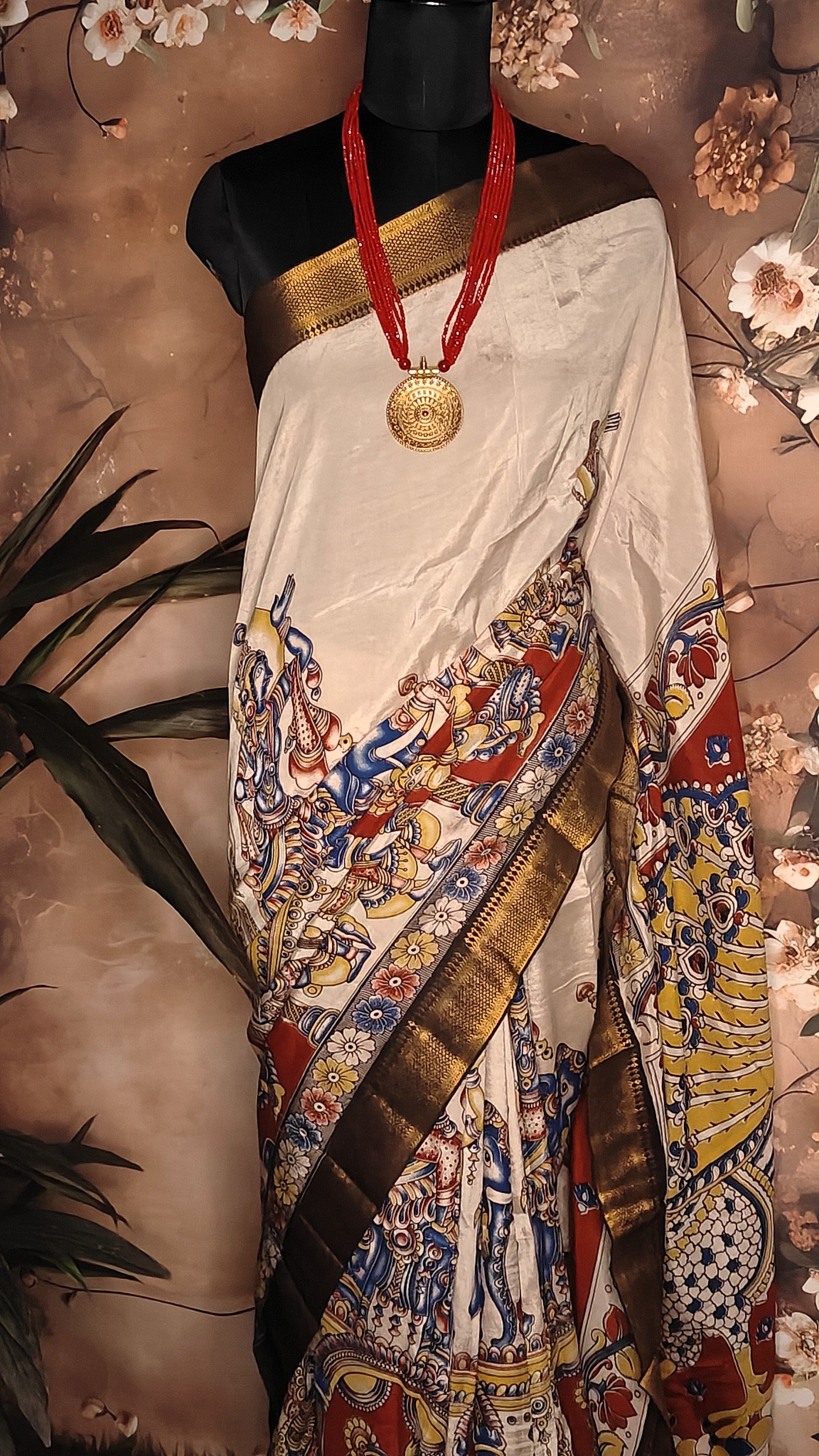 Handcrafted Mangalgiri Border Silk Saree with Temple Art Motifs-Cream color saree with intricate patterns on a mannequin against a neutral background.