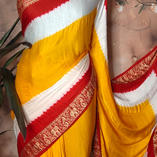 Yellow & Magenta Modal Silk Saree with Zari Border – Festive Wear for Weddings & Celebrations