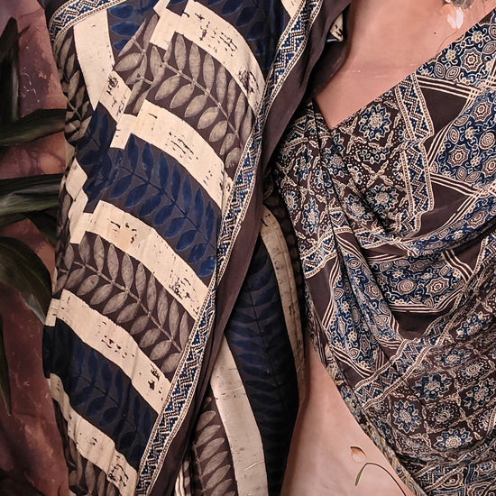 Ajrakh Modal Silk Saree – Dark Blue, Beige & Black with Geometric Floral Pallu saree with intricate patterns draped over a mannequin.