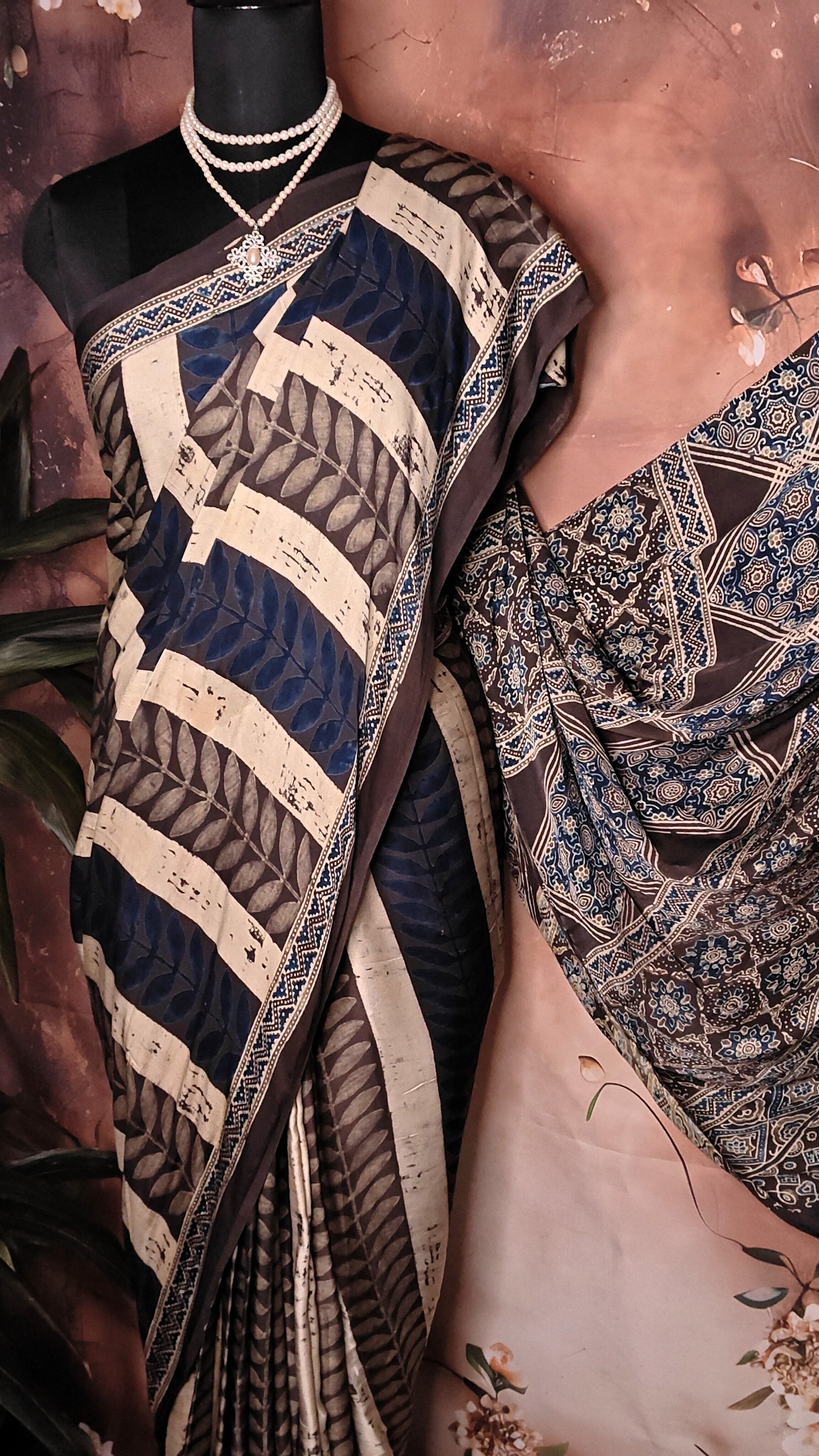 Ajrakh Modal Silk Saree – Dark Blue, Beige & Black with Geometric Floral Pallu saree with intricate patterns draped over a mannequin.