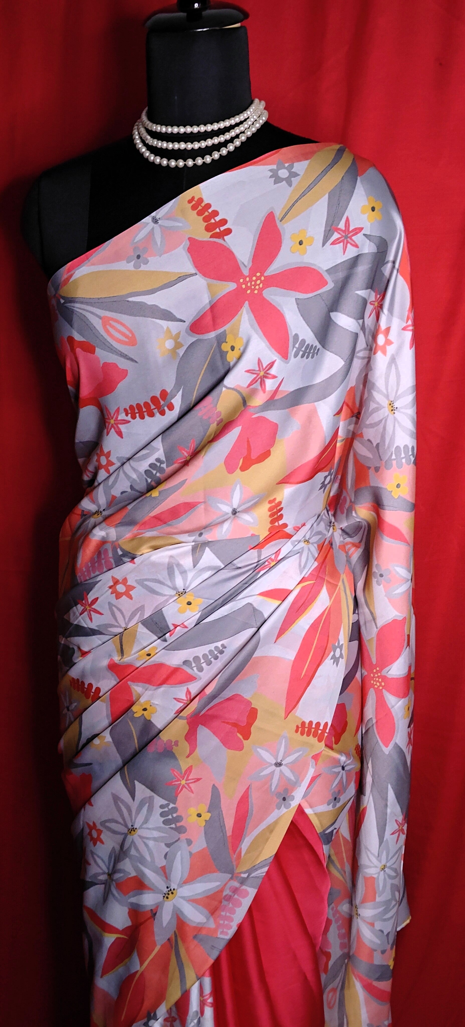 Designer Satin-Georgette Saree – Grey Base with Multicolor Floral Print saree draped on a mannequin.