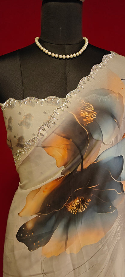 Cream satin georgette saree with oversized floral print and silver scalloped border, styled on mannequin showcasing the blouse piece against a red background.