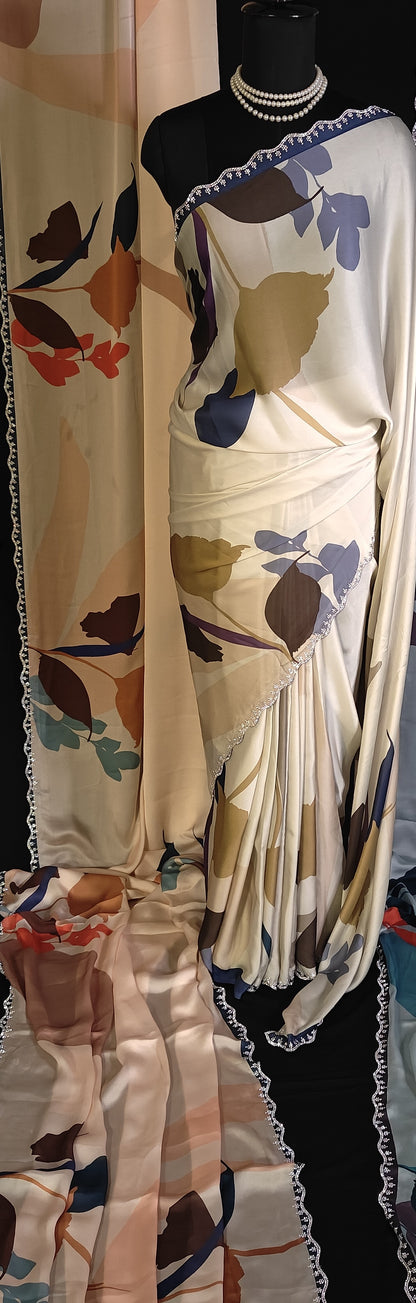 Mannequin wearing a Peach satin-georgette saree featuring bold floral motifs and delicate lace trim, elegant saree for daytime functions.