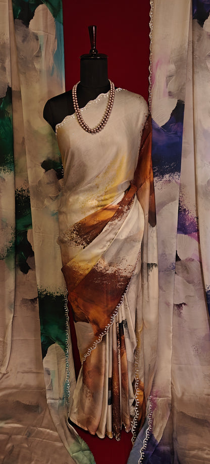 White satin georgette saree with abstract brown brushstroke print and scalloped border on a mannequin along with similar saree in blue and green hanging side by side with a red background.