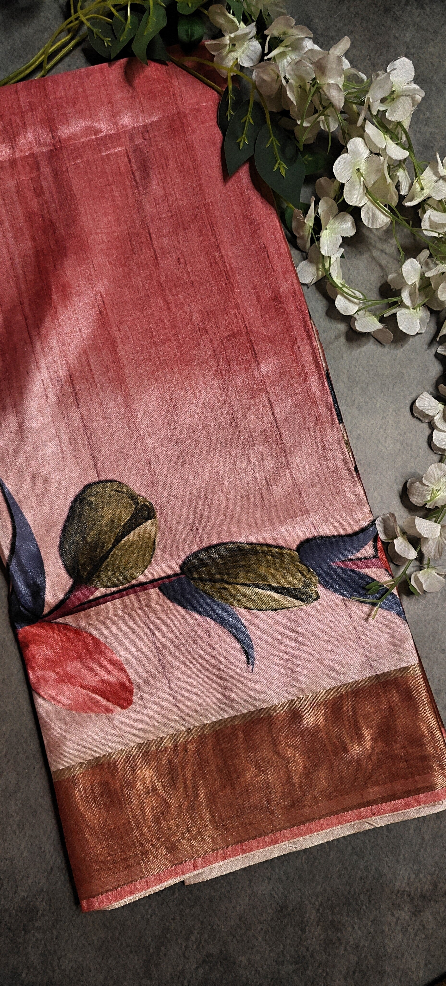 Pink viscose silk saree with floral accents, soft drape and elegant styling for cultural events