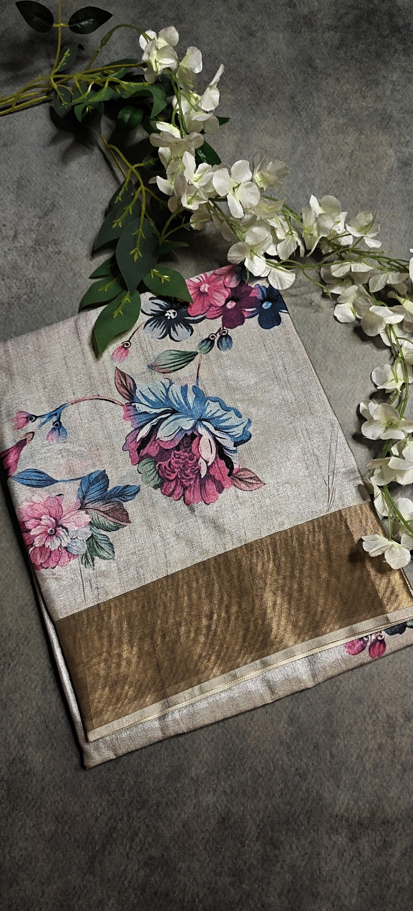Grey viscose silk blend saree with subtle floral print, soft and elegant ethnic attire for formal events