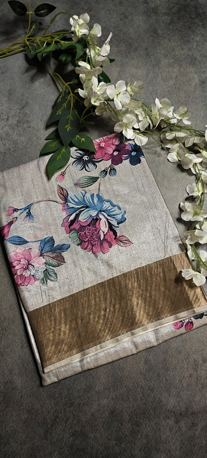 Grey viscose silk blend saree with subtle floral print, soft and elegant ethnic attire for formal events