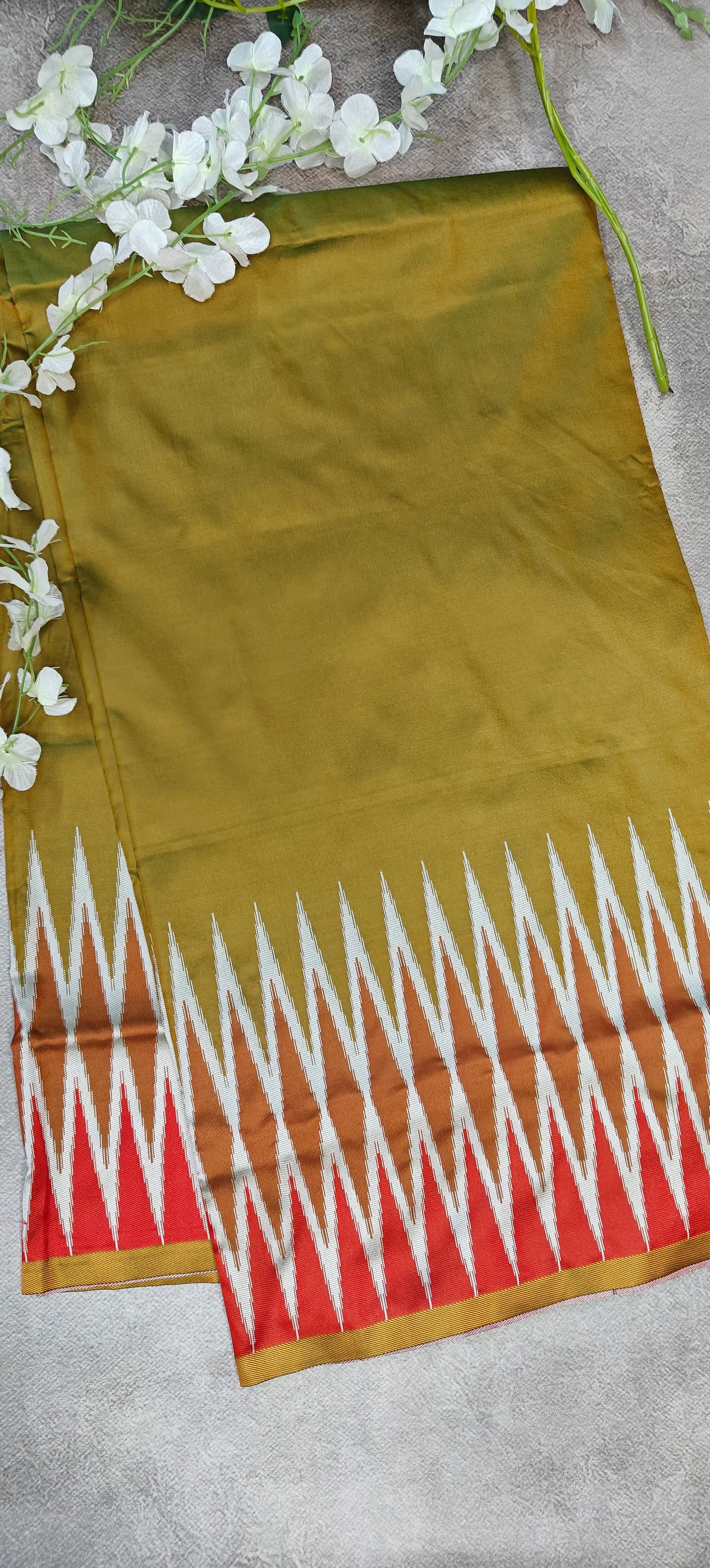 Mustard yellow viscose silk saree with soft texture and festive styling.